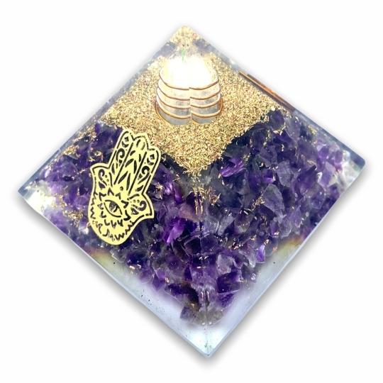 Side View of Amethyst Orgonite Pyramid - Ancient Infusions. Transmute negative energy and create a harmonious atmosphere with orgonite technology.