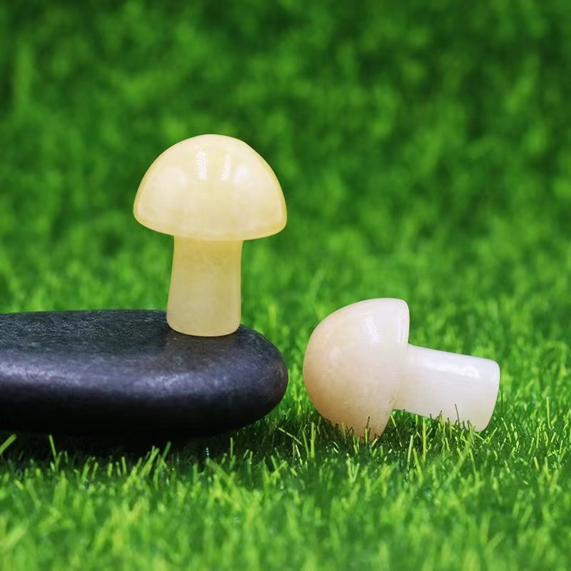 Ancient Infusions Yellow Jade Carved Mushroom - Bask in the illuminating tranquility. Front view highlighting the soothing energy of Yellow Jade.