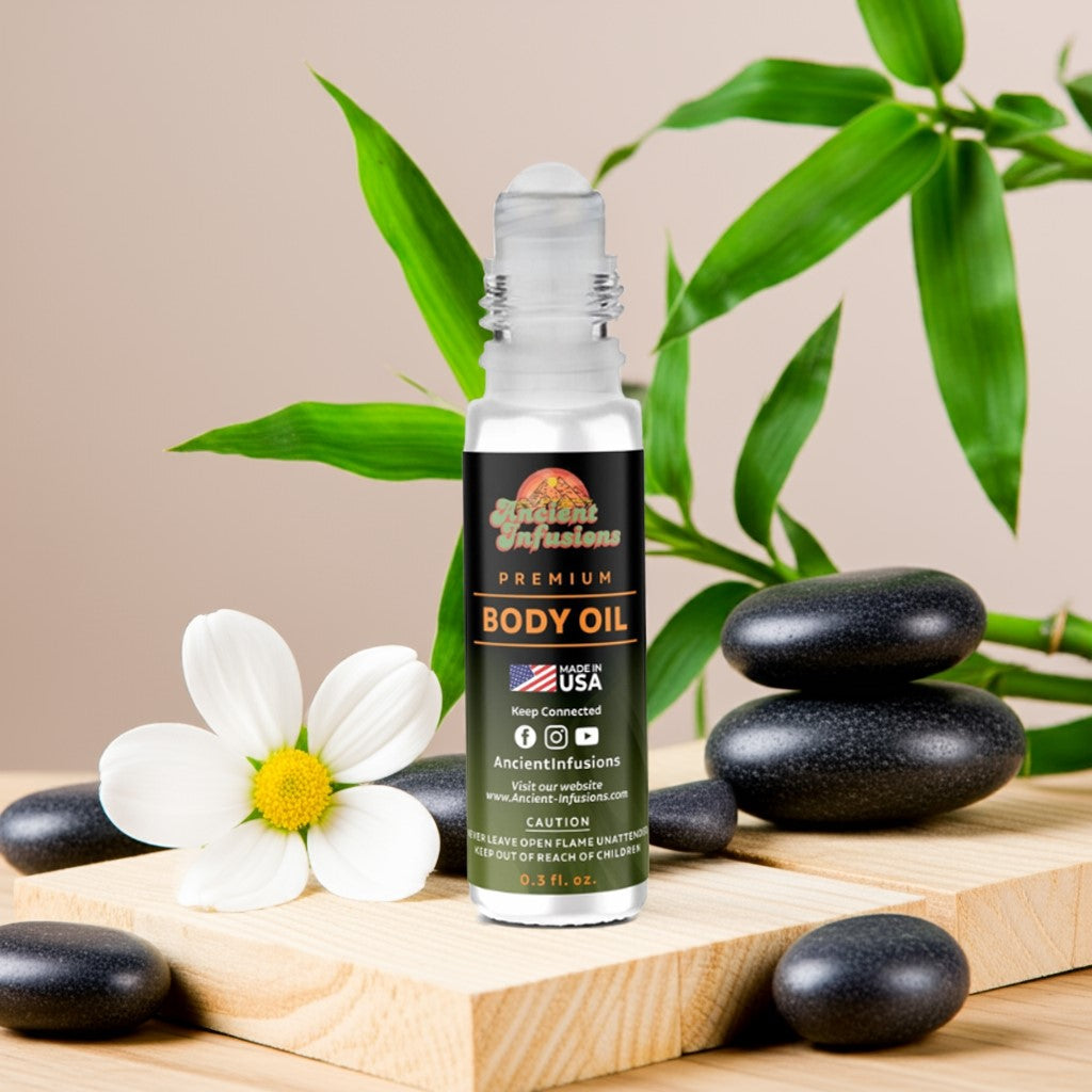 Gucci Bamboo Body oil bottle with bamboo leaves, stones, and a flower on a wooden surface.