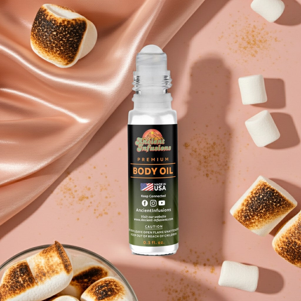 Kayali Boujee Marshmallow Inspired Body Oil with toasted marshmallows and whipped vanilla on a pink surface