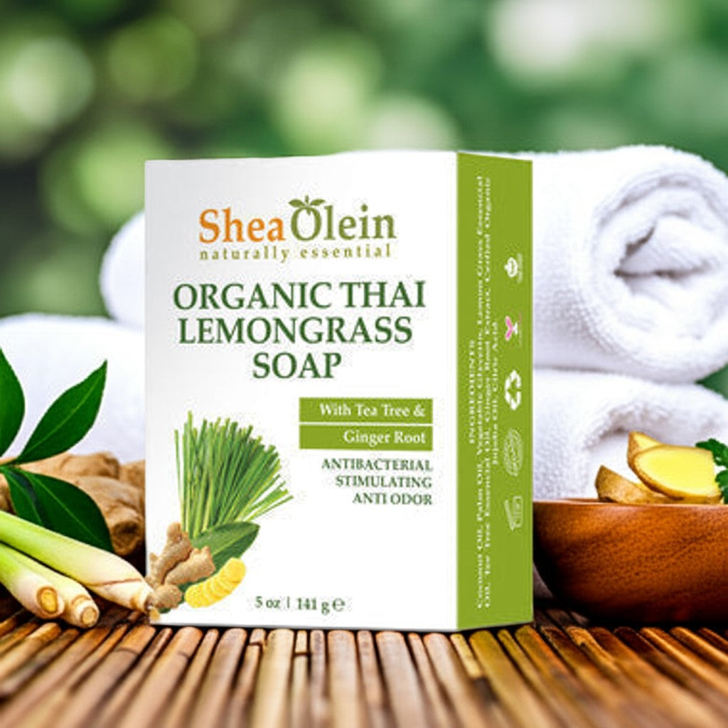 Shea Olein Organic Lemongrass Soap box with tea tree and ginger root on a wooden counter – natural odor protection and antibacterial cleansing bar.