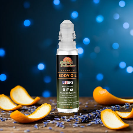 Versace Blue Jeans inspired body oil bottle standing on wood with citrus and herbs