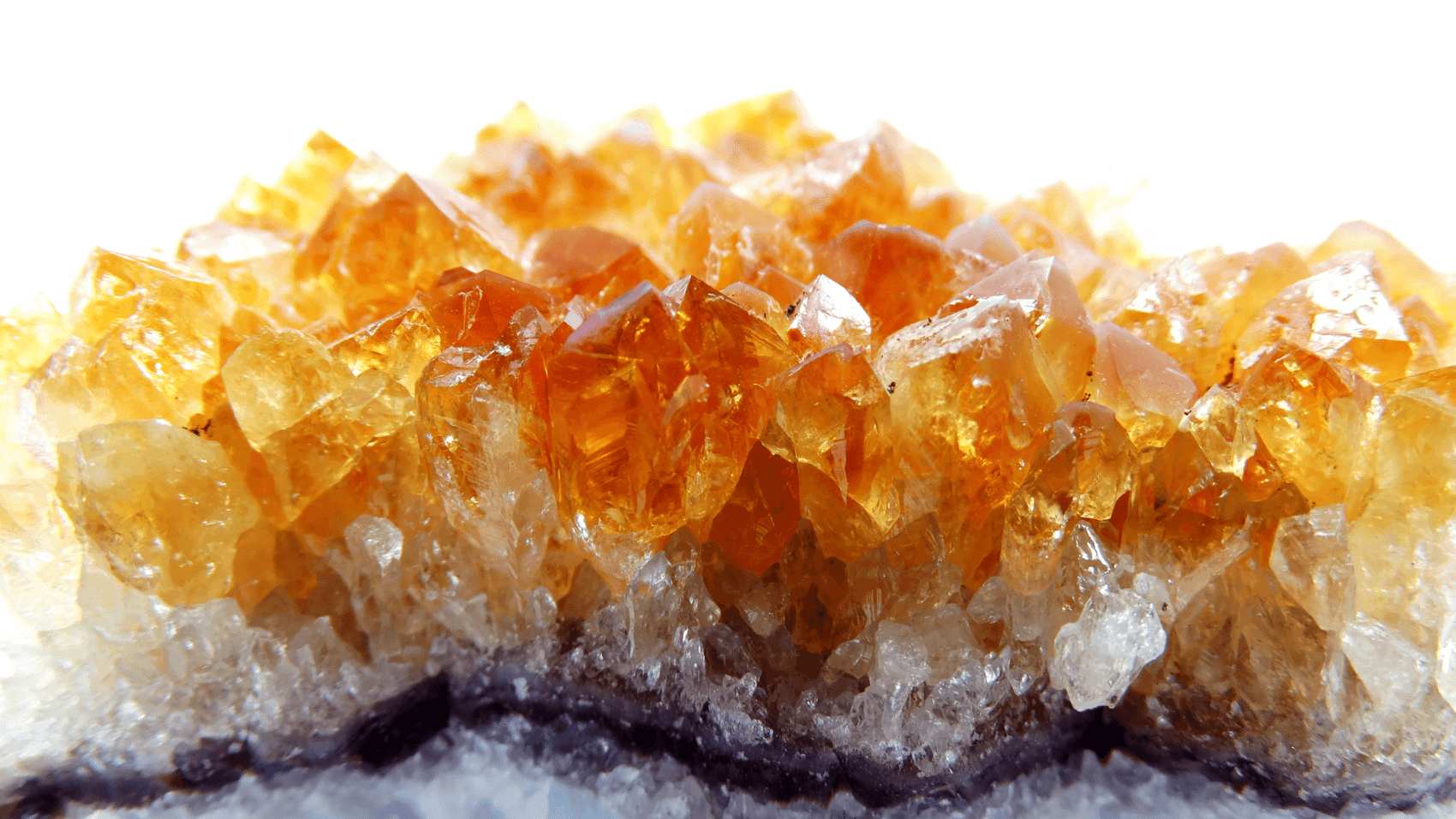 Sparkling Sunlight: Exploring the Allure, Benefits, and Spiritual Meaning of Citrine Crystals and Jewelry - Uncover the radiant charm, abundance, and positivity of citrine with Ancient Infusions.