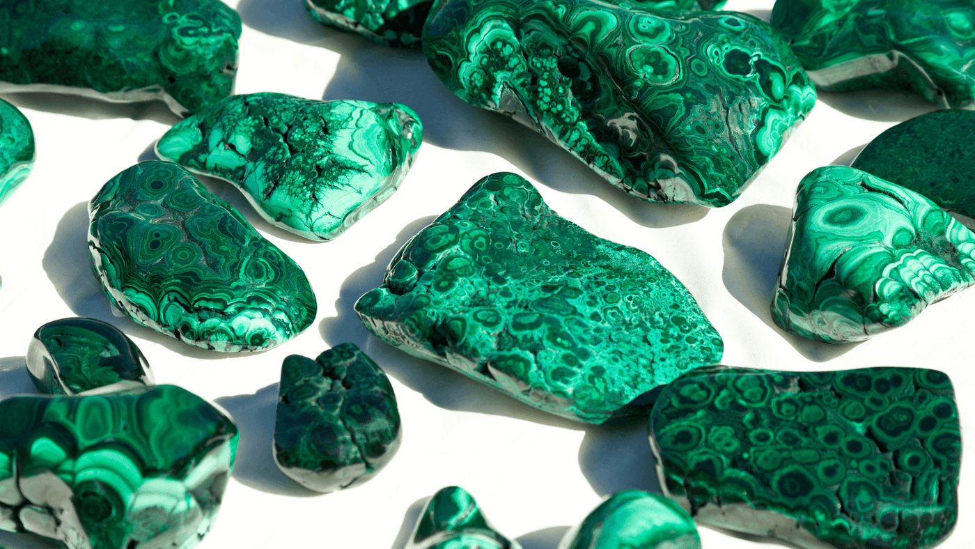 Malachite: The Green Guardian of Transformation - Meanings, Uses, and Spiritual Benefits - A mesmerizing green mineral symbolizing transformation and protection.