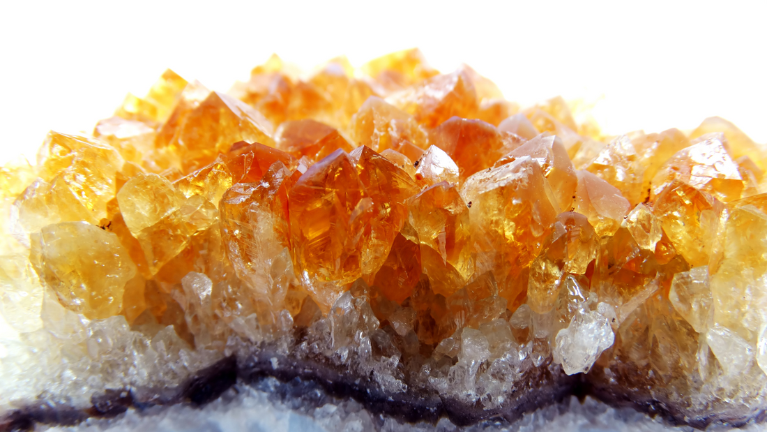 Sparkling Sunlight: Exploring the Allure, Benefits, and Spiritual Meaning of Citrine Crystals and Jewelry - Uncover the radiant charm, abundance, and positivity of citrine with Ancient Infusions.