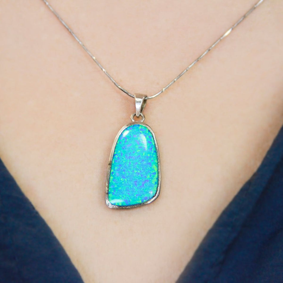 Modern Elegance - Ancient Infusions Stainless Steel Crystal Pendant Necklaces Collection. Dazzling Gemstone Pendants for Timeless Beauty and Contemporary Style.