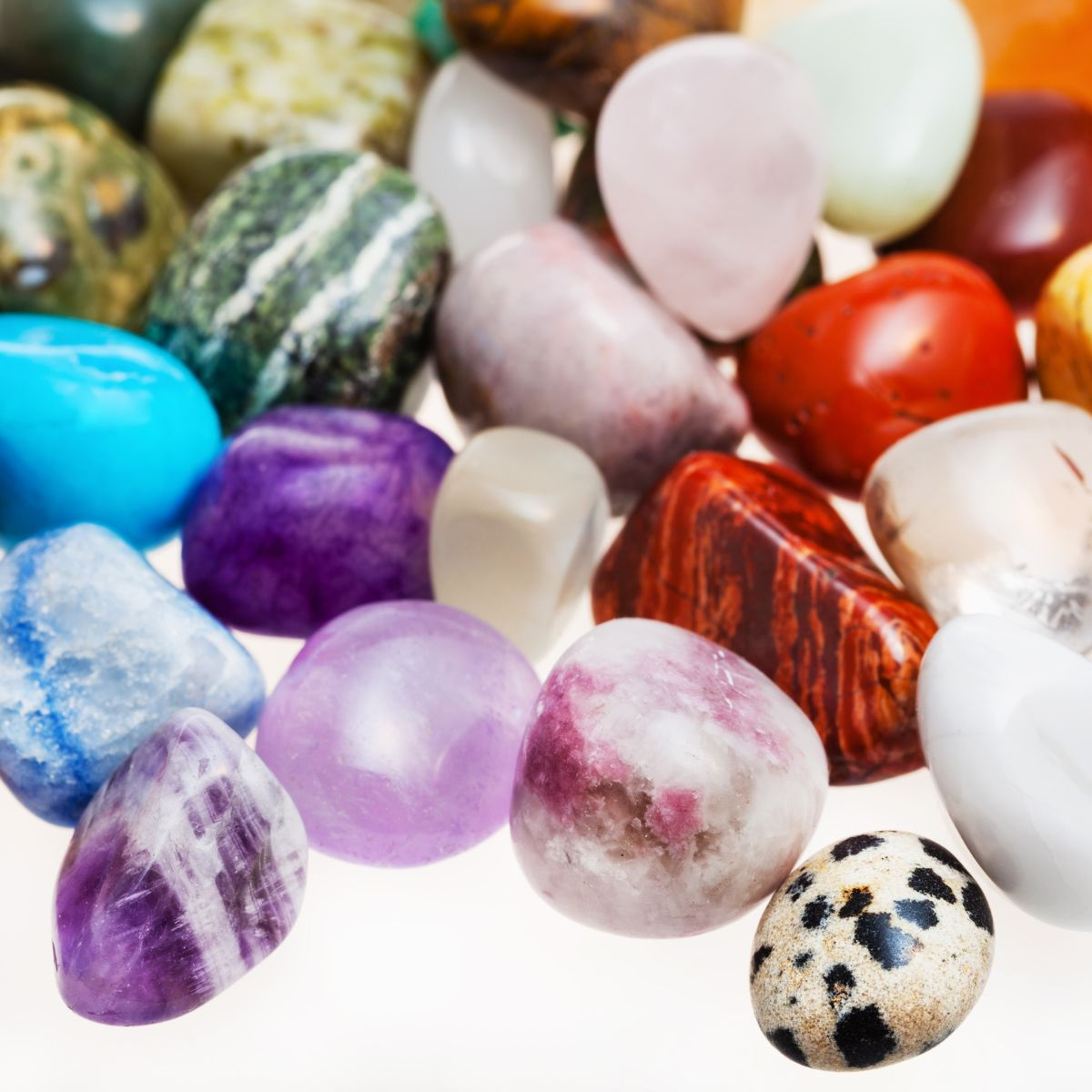 Discover Natural Splendor - Ancient Infusions Tumbled Crystal Collection. Smooth Gemstone Treasures for Spiritual Connection and Style.