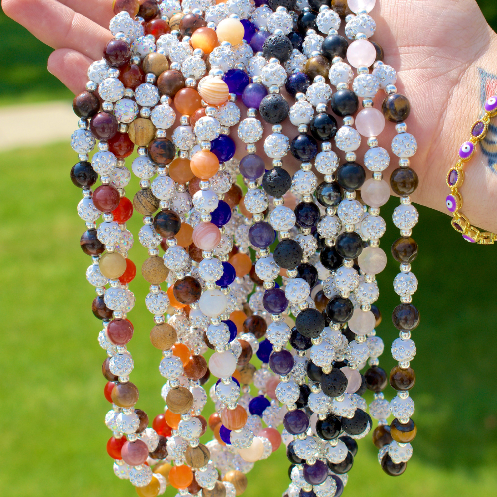 Ancient Infusions Crystal Beaded Necklaces Collection featuring handcrafted necklaces with genuine crystals for healing, peace, and spiritual growth.