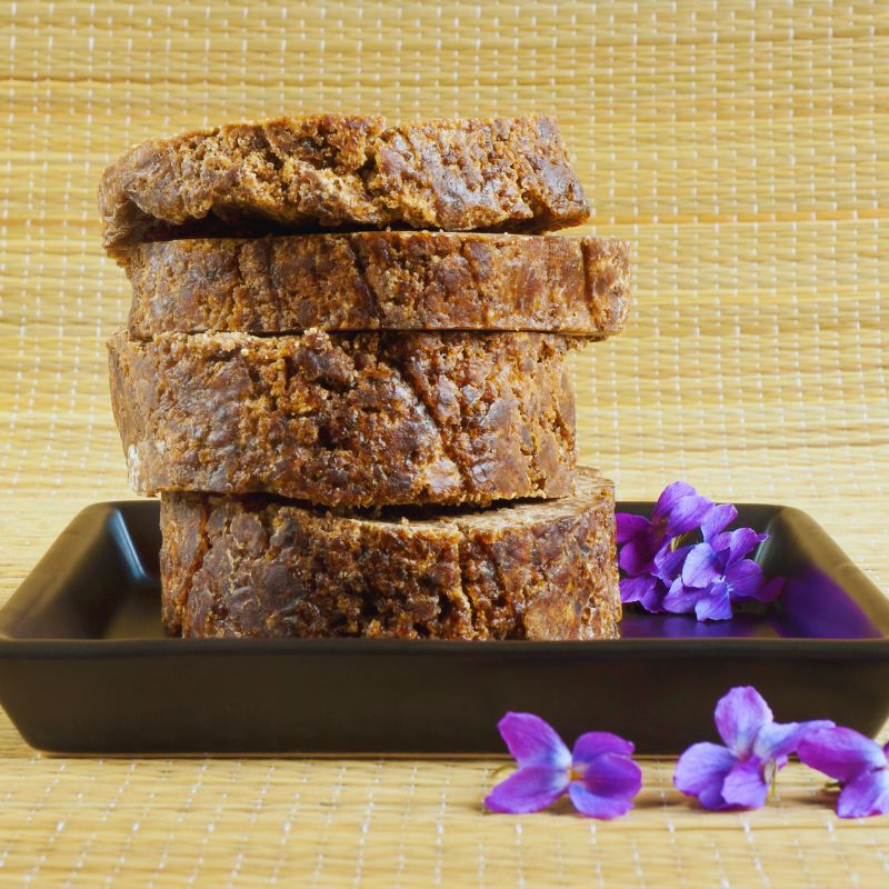 Display of Raw African Black Soap Collection products for face and body care