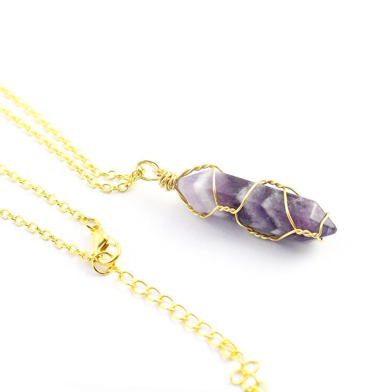 Close-up of Ancient Infusions Amethyst Gemstone Pendant - Harmonious and Elegant Jewelry. Experience enhanced spiritual serenity and inner balance with the properties of Amethyst.