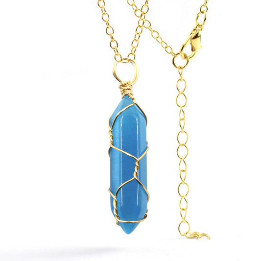 Ancient Infusions Blue Cat's Eye Mystique Pendant - Genuine Gemstone on Stainless Steel Chain. Embrace tranquil elegance and enigmatic style with Blue Cat's Eye.