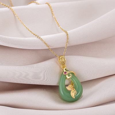 Ancient Infusions Harmony Glow Green Jade Pendant Necklace on Adjustable Stainless Steel Chain - Tranquil Elegance for Soothing Balance.