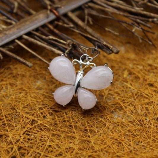 Ancient Infusions Love's Embrace Rose Quartz Crystal Butterfly Pendant Necklace on Adjustable Stainless Steel Chain - Gentle Elegance for Heart-Opening Energy.