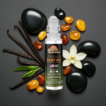 Black Love Body Oil bottle with stones, vanilla, and amber stones for a luxurious feel