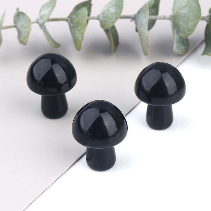 Black Obsidian Carved Mushroom by Ancient Infusions - Experience the grounding energy in miniature.