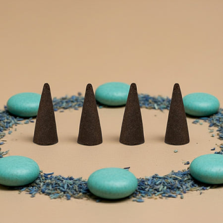 Cool Water Incense Cones on a beige surface with turquoise stones and blue decorative elements.