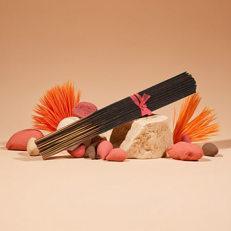 Fresh Peach Incense Sticks with decorative elements on a beige background