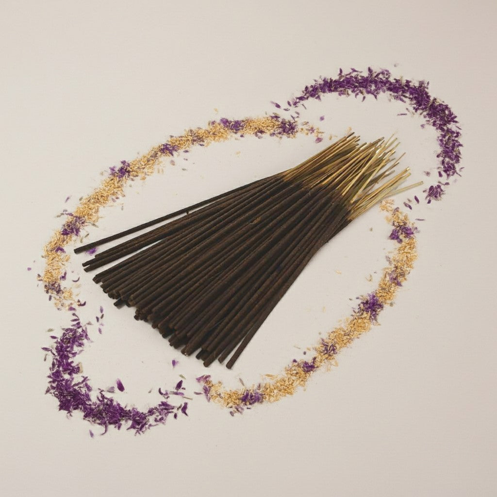 Imported Alien Inspired Incense Sticks arranged in a circular pattern with decorative elements on a light background