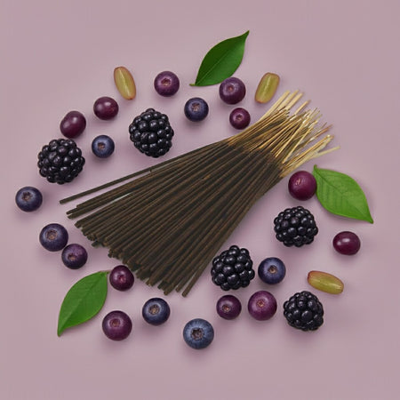 Imported Blueberry Grapes Incense Sticks with berries and leaves on a pink background