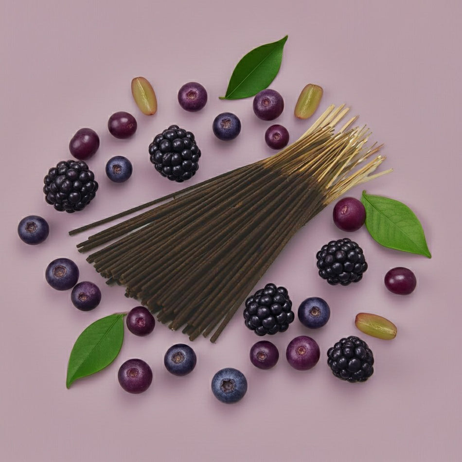 Imported Blueberry Grapes Incense Sticks with berries and leaves on a pink background