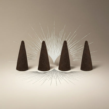Imported Tahara Musk Incense Cones on a beige background with radiating lines.