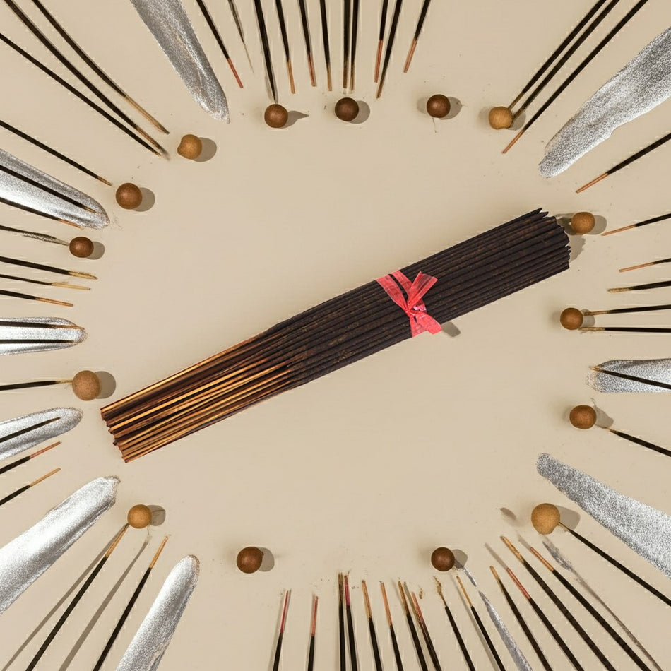 Imported Tahara Musk Incense Sticks with a pink ribbon arranged in a circular pattern on a beige background