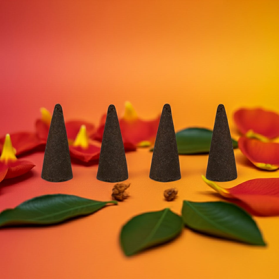 Orange Incense Cones on a colorful floral background