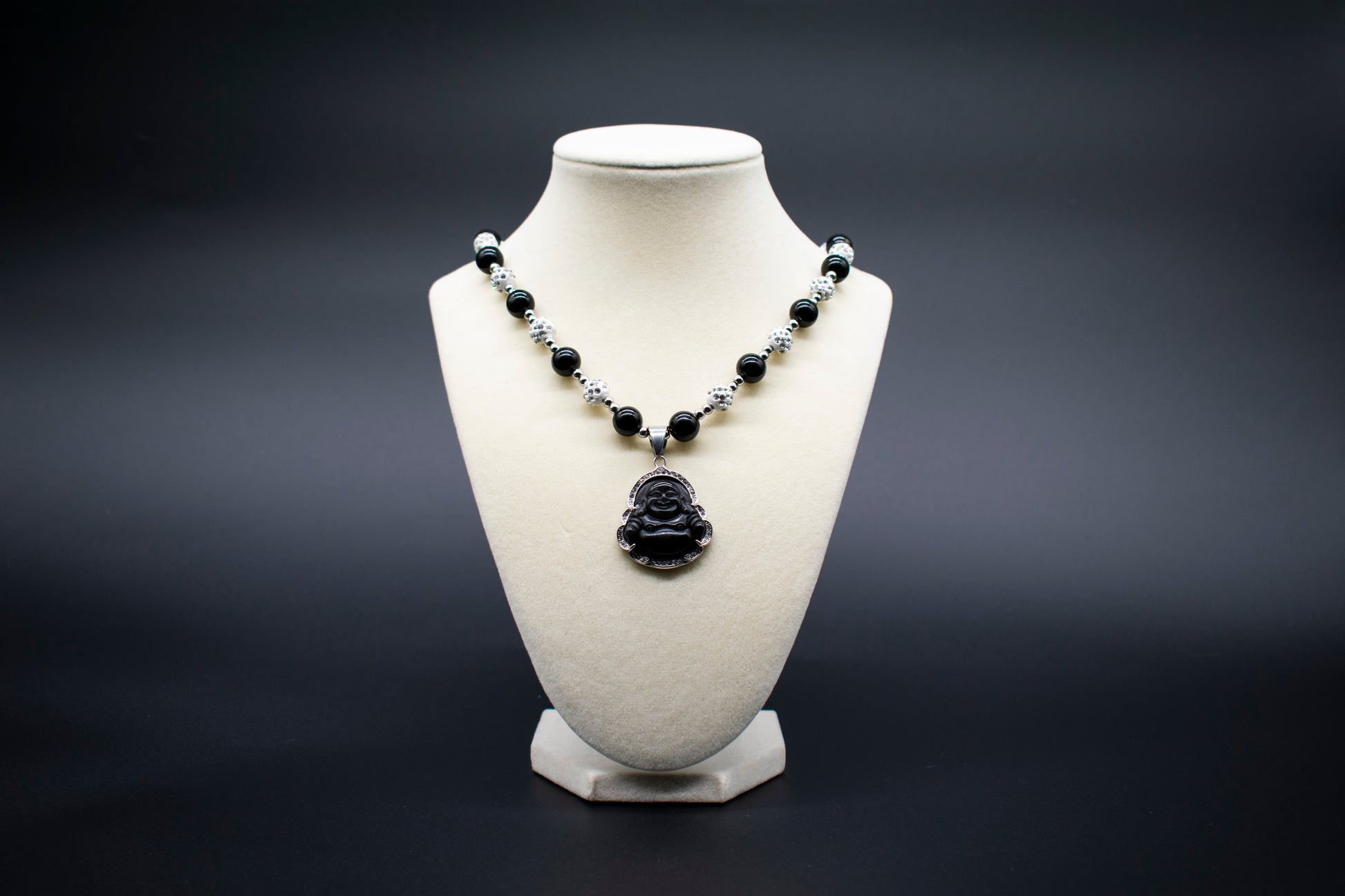 Ancient Infusions Custom Beaded Black Obsidian Necklace with Laughing Buddha pendant, handcrafted with genuine crystals to promote joy, abundance, and positive energy.