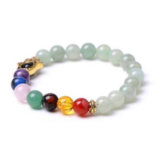Ancient Infusions - Embrace tranquility with our 7 Chakra Green Aventurine Hamsa Bracelet, thoughtfully designed for spiritual well-being.