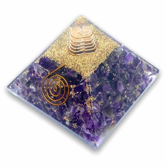 Ancient Infusions Amethyst Healing Orgonite Pyramid - Front View. Harness the calming energy of Amethyst crystal in this powerful orgonite pyramid.