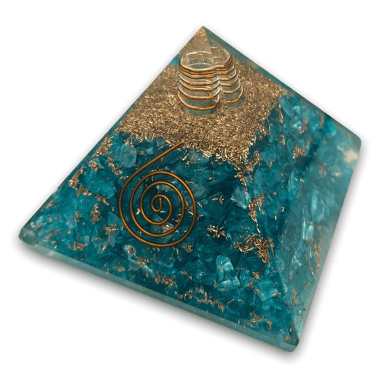 Discover tranquility with the Ancient Infusions Aquamarine Orgonite Pyramid - Front View. Let the soothing energy of aquamarine bring clarity and emotional balance to your space.