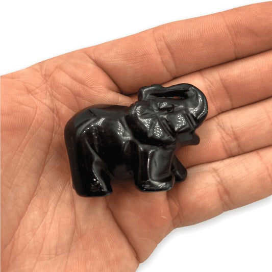 Ancient Infusions Black Obsidian Crystal Carved Elephant - Experience the protective energy of black obsidian in this hand-carved miniature masterpiece.