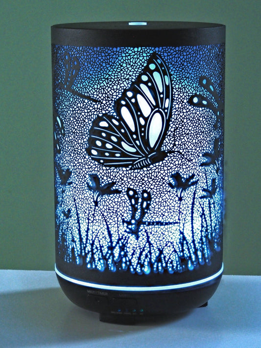 Savor tranquility with the Ancient Infusions Butterflies & Dragonflies Aromatherapy Diffuser, a beautiful aromatherapy machine releasing essential oils for a wellness experience inspired by nature's elegance.