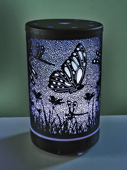 Elegant aromatherapy machine with butterflies and dragonflies design.