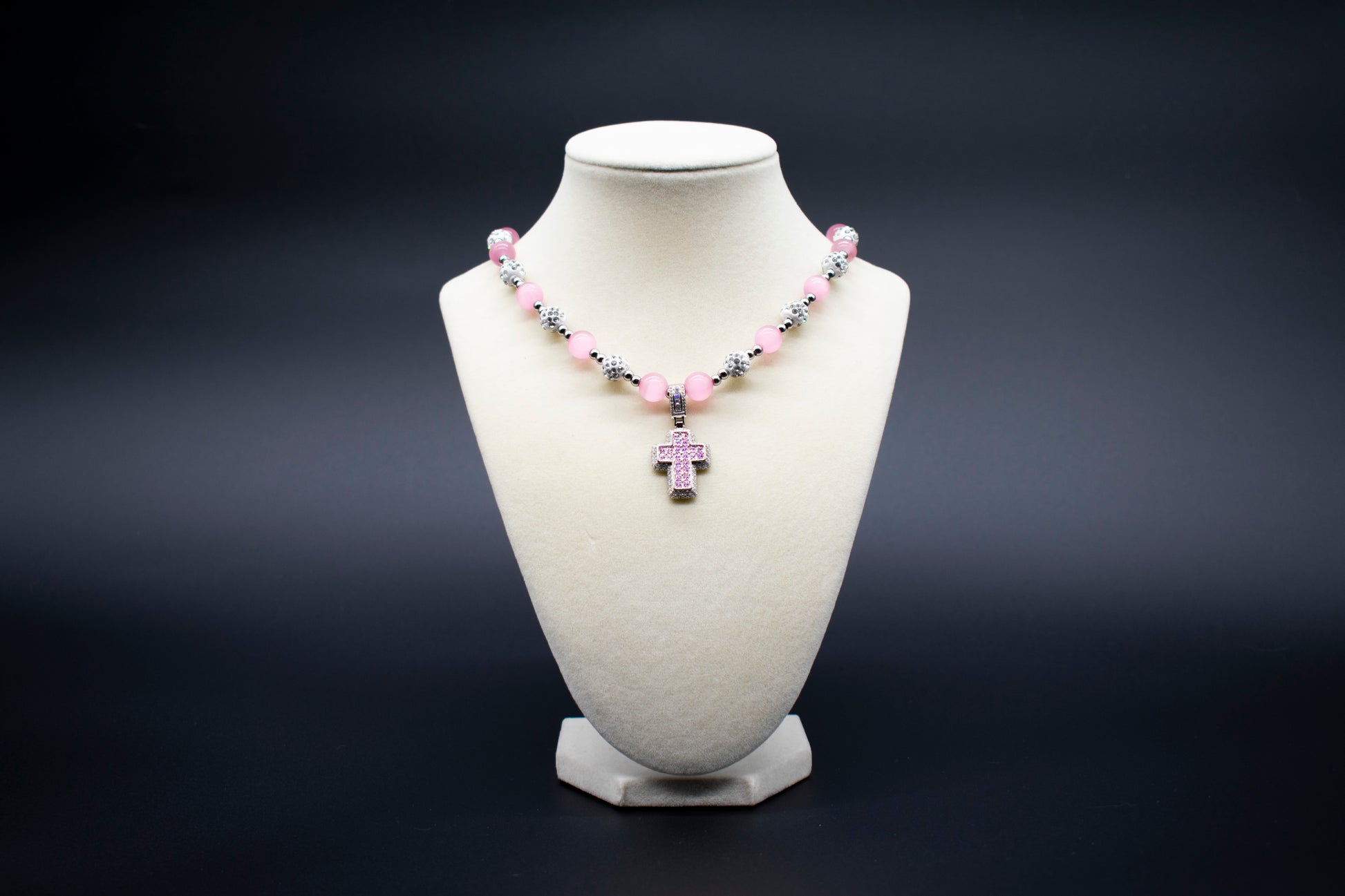 Ancient Infusions Custom Beaded Pink Cat’s Eye Necklace with cross pendant, handcrafted with genuine crystals to promote love, protection, and intuition. Available in multiple lengths.