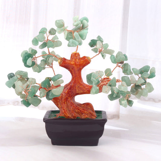 Bring nature's harmony into your home with our Green Aventurine Bonsai Crystal Tree. Hand-wired with over 150 green aventurine crystals for a serene and rejuvenating atmosphere.