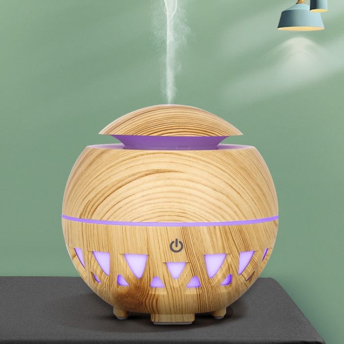 Ancient Infusions Mini Aromatherapy Diffuser - Compact Wellness Companion for Stress Relief and Relaxation.