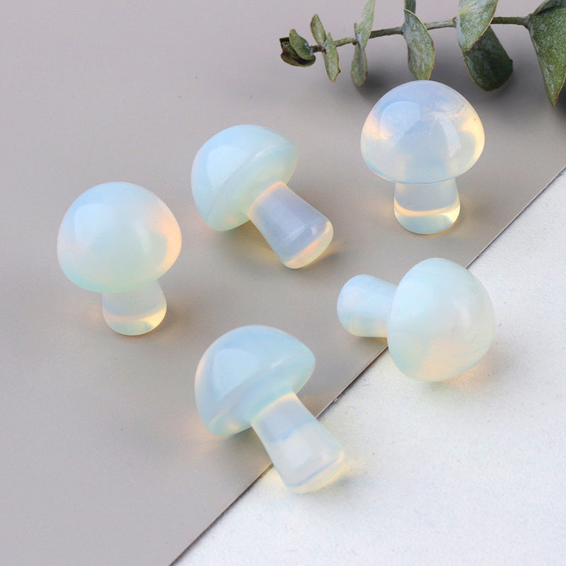 Opalite Carved Mushroom by Ancient Infusions - Side view highlighting the intricate details and spiritual properties of Opalite.