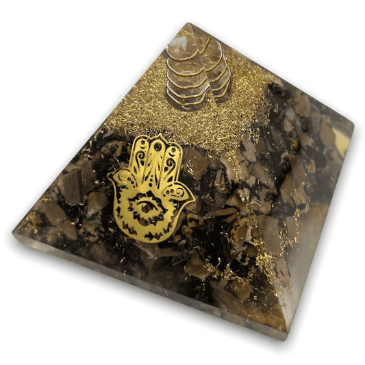 Ancient Infusions Rhodonite Orgonite Pyramid - Infuse your space with love and vitality using the balancing energy of Rhodonite crystal and the positive effects of orgonite.