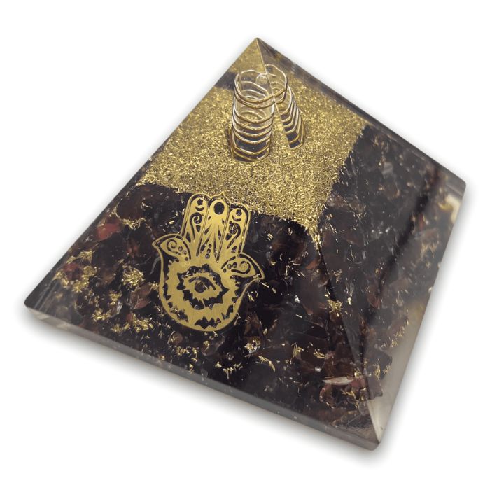 Ancient Infusions Red Garnet Orgonite Pyramid - Harness the passionate energy of Red Garnet and the harmonizing effects of orgonite for a revitalized space.