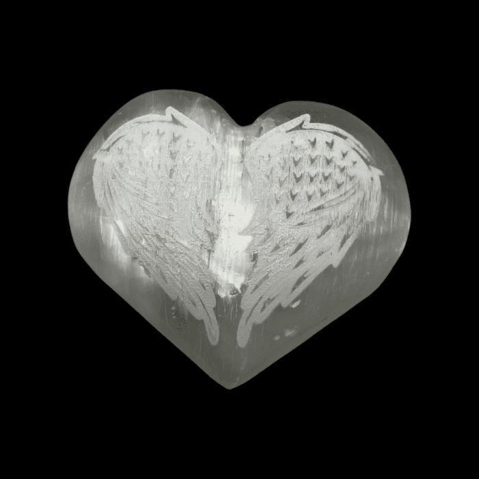 Selenite Carved Heart With Angel Wings by Ancient Infusions - Angled view highlighting the intricate hand-carved details and inviting celestial energies.