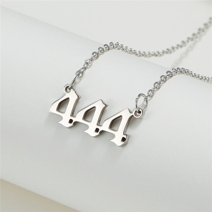 Ancient Infusions stainless steel necklace with Angel Number 444 pendant in silver.