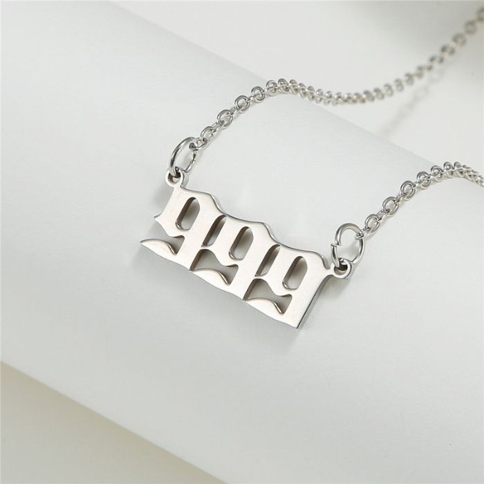 Ancient Infusions stainless steel necklace with Angel Number 999 pendant in silver.