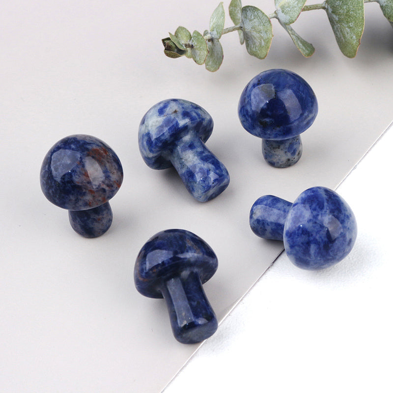 Sodalite Carved Mushroom by Ancient Infusions - Side view highlighting the miniature size and harmonizing properties of Sodalite.