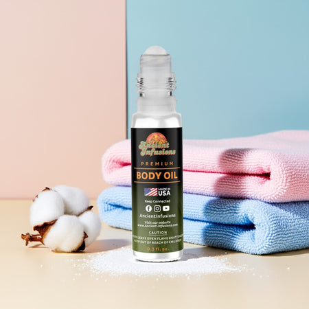 Baby Powder body oil bottle with cotton and towels on a pastel background