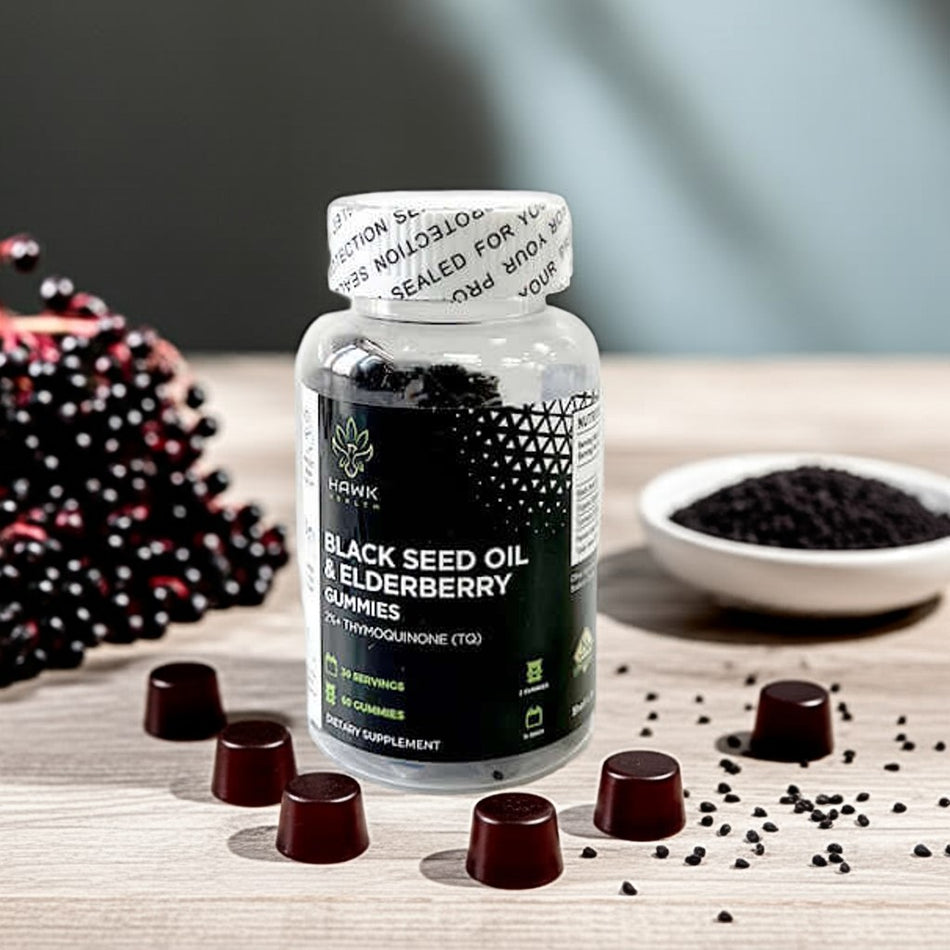 Bottle of Black Seed Oil & Elderberry Gummies with surrounding ingredients on a wooden surface