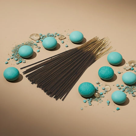 Turquoise bath bombs and Cool Water Incense Sticks on a beige background