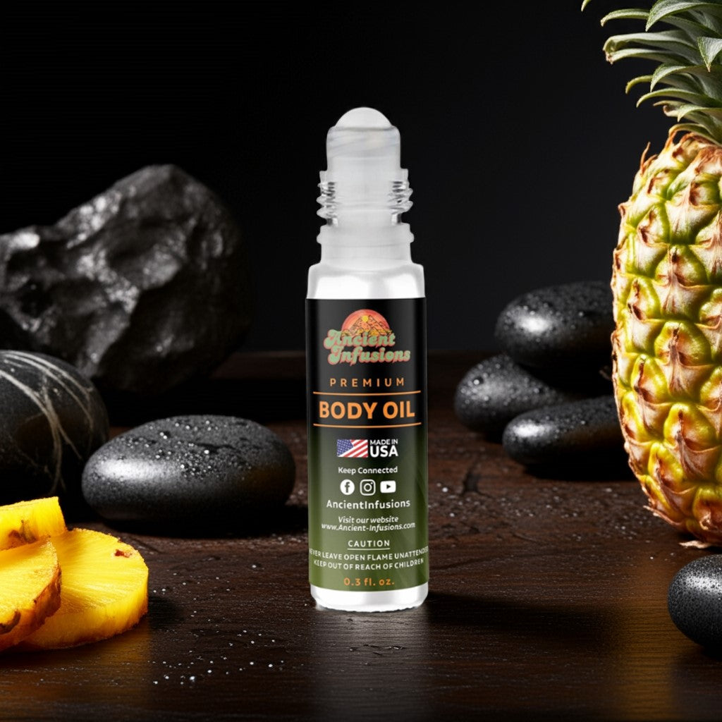 Creed Aventus (Inspired) Body oil bottle with pineapple and stones on a dark background