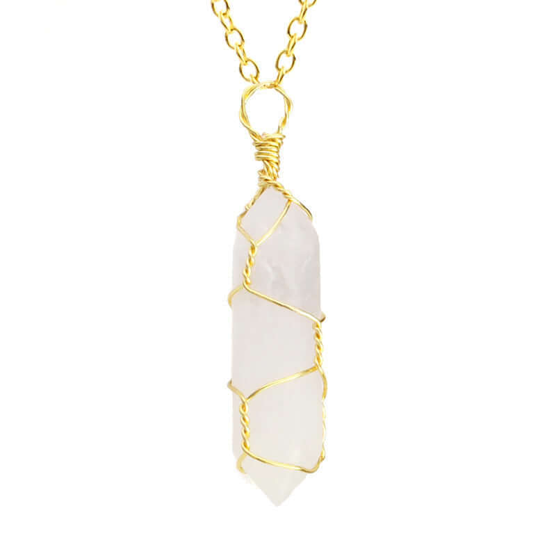 Close-up of a Crystal Quartz Necklace featuring a clear gemstone wrapped in handcrafted gold wire with a stainless steel chain.