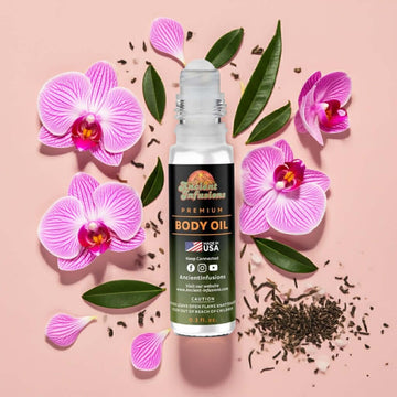 Viktor&Rolf Flowerbomb Inspired Body Oil with floral and tea accords surrounded by jasmine and orchid petals on a soft background.